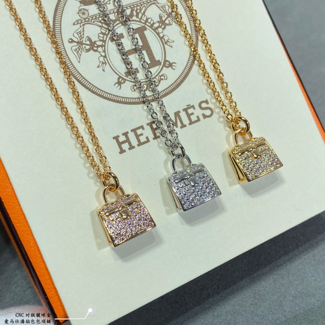 hermès fully Di*m*nd-encrusted bag necklace