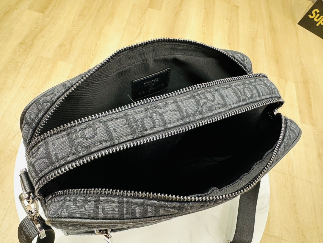 D*or maxi safari bag with strap blue D*or oblique jacquard 10 x 6.5 x 3 inches